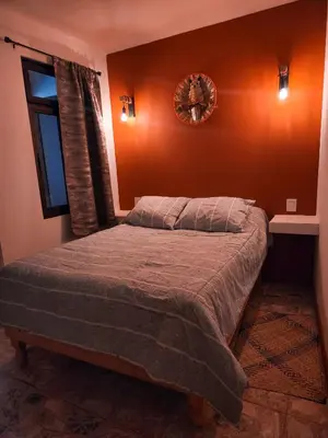 Cama o camas de una habitación en Habitaciones Casa Bule