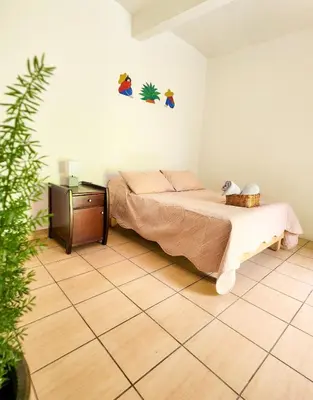 Cama o camas de una habitación en Habitaciones Casa Bule