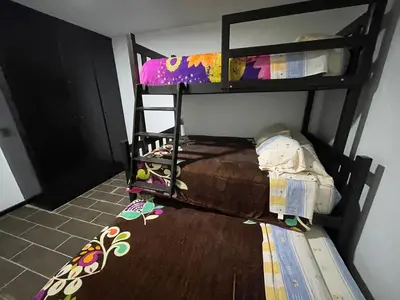 Cama o camas de una habitación en Hospedaje Chignahuapan