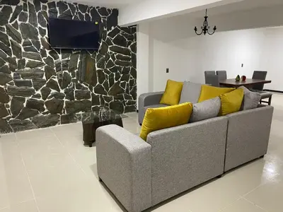 Una televisión o centro de entretenimiento en Hospedaje Chignahuapan