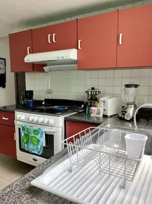 Una cocina o zona de cocina en CASA MERiTHIA, Céntrica Casa Ejecutiva