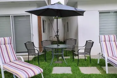 Jardín al aire libre en La ideal Alberca climatizada