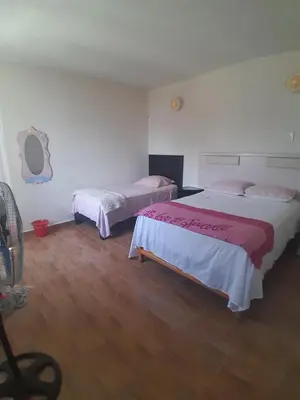 Cama o camas de una habitación en Casa Vacacional Morelos