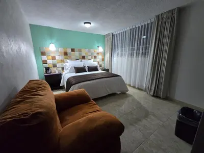 Cama o camas de una habitación en Condesa Hotel Boutique Zacatlán