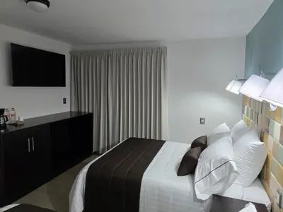 Cama o camas de una habitación en Condesa Hotel Boutique Zacatlán