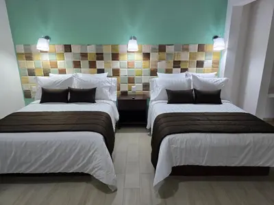 Cama o camas de una habitación en Condesa Hotel Boutique Zacatlán