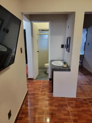 Una televisión o centro de entretenimiento en Casa Dali