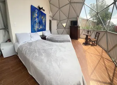 Cama o camas de una habitación en Glamping Cholula