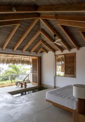 Cama o camas de una habitación en Casa Xee - La Flia Beach House Luxury