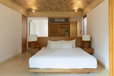 Cama o camas de una habitación en Casa Yaa - La Flia Beachfront Luxury