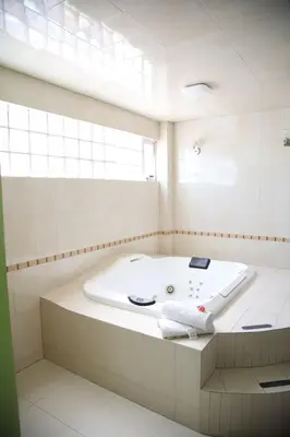 Un baño de Hotel RENACIMIENTO