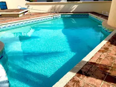 Piscina en o cerca de Depto a 3 cuadras de la playa