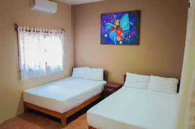 Cama o camas de una habitación en Posada El Mágico