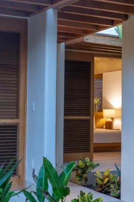 Cama o camas de una habitación en Casa Nisa - La Flia Beachfront Luxury