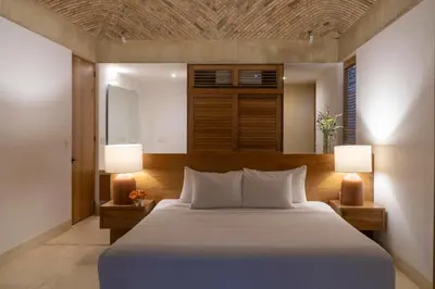 Cama o camas de una habitación en Casa Nisa - La Flia Beachfront Luxury