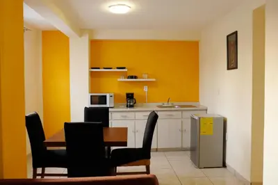 Una cocina o zona de cocina en Sensity Home Departamento 3 Encantador, Acogedor y Amplio