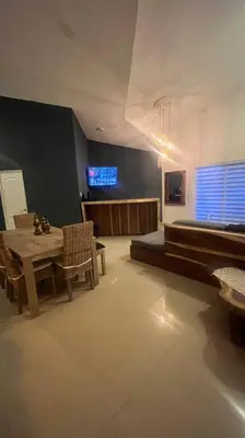 Una televisión o centro de entretenimiento en Departamento Rubi en Diamante Lakes