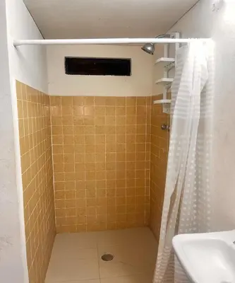 Un baño de OYO Hotel Rincon De Texolo