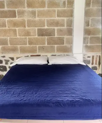 Cama o camas de una habitación en OYO Hotel Rincon De Texolo