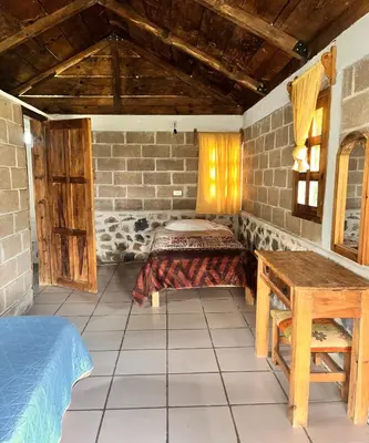 Cama o camas de una habitación en OYO Hotel Rincon De Texolo