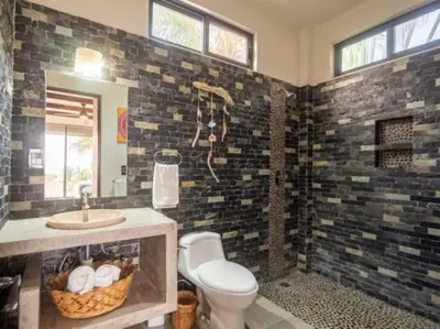 Un baño de Villa De Las Rocas