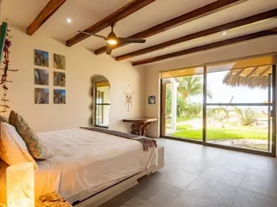Cama o camas de una habitación en Villa De Las Rocas