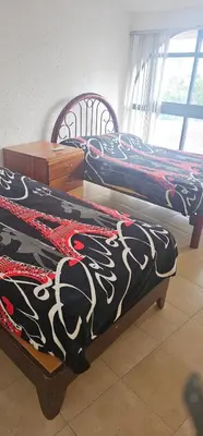 Cama o camas de una habitación en QUINTA Brisas