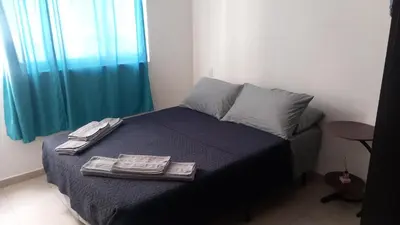 Cama o camas de una habitación en Aeropuerto Pantitlán CDMX