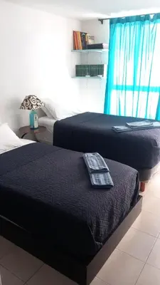 Cama o camas de una habitación en Aeropuerto Pantitlán CDMX
