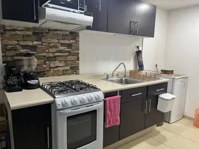 Una cocina o zona de cocina en Aeropuerto Pantitlán CDMX