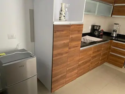 Una cocina o zona de cocina en Departamento en zona Angelopolis