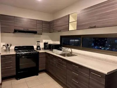 Una cocina o zona de cocina en Blue Towers Piso 9 - Departamento Moderno en Puebla