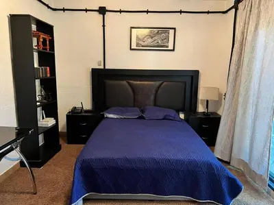Cama o camas de una habitación en Casa con alberca 685