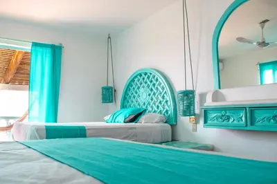 Cama o camas de una habitación en Hotel Costa 55 Puerto Escondido