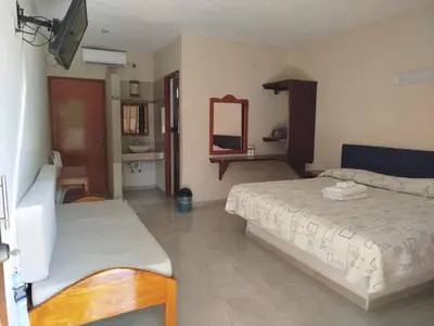Cama o camas de una habitación en Playa Encantada