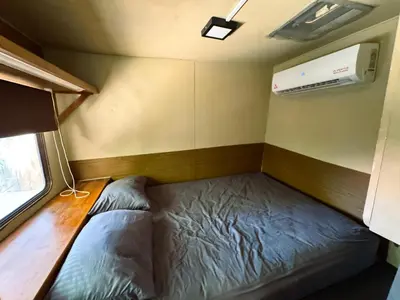 Cama o camas de una habitación en Hostal Juárez Puerto Escondido