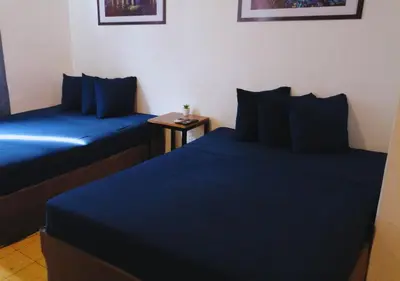 Cama o camas de una habitación en Depa Familiar a 2 cuadras del Auditorio Benito Juárez