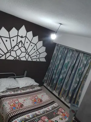 Cama o camas de una habitación en Renta de Habitaciones en muy buena ubicación