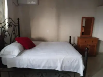 Cama o camas de una habitación en Hotel La Laguna