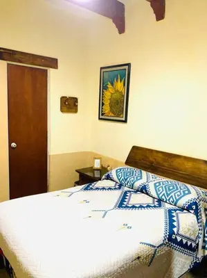 Cama o camas de una habitación en La Casita de Juana Pancha