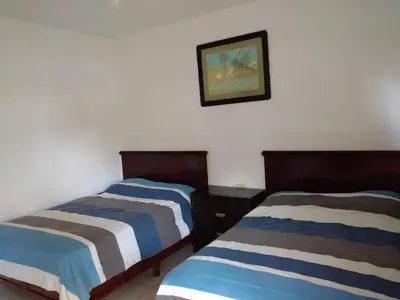 Cama o camas de una habitación en Hotel Mariam
