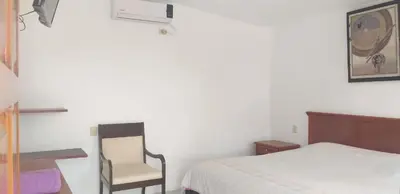 Cama o camas de una habitación en Hotel Mariam