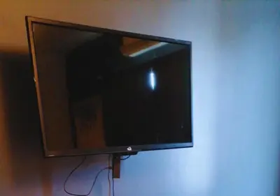 Una televisión o centro de entretenimiento en Departamento a 1 minuto de la terminal ADO
