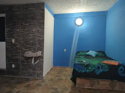 Cama o camas de una habitación en Hostal