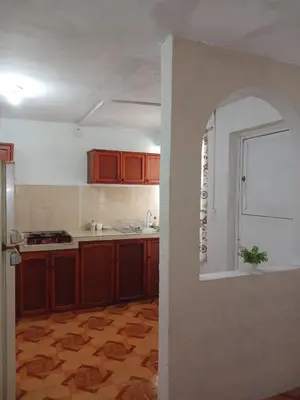 Una cocina o zona de cocina en Cómodo alojamiento para varias personas