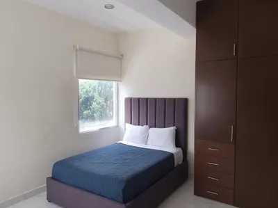 Cama o camas de una habitación en Apartamento de lujo Col La Paz 101