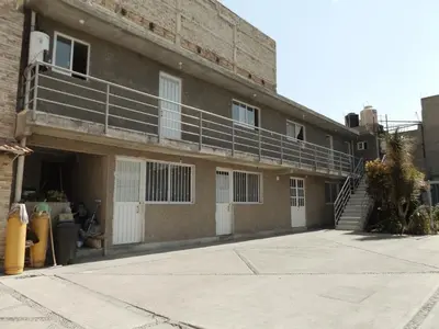 Edificio en el que se encuentra la habitación en casa particular