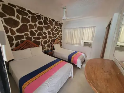 Cama o camas de una habitación en Tranquilo y cómodo Bungalow