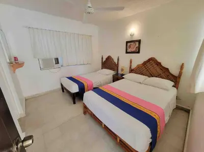 Cama o camas de una habitación en Tranquilo y cómodo Bungalow