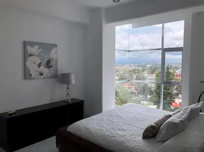 Cama o camas de una habitación en Apartamento de lujo Col La Paz 201
